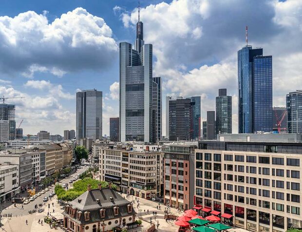 The skyline of Frankfurt am Main, featuring the skyscrapers of the financial district and a view of the city centre.